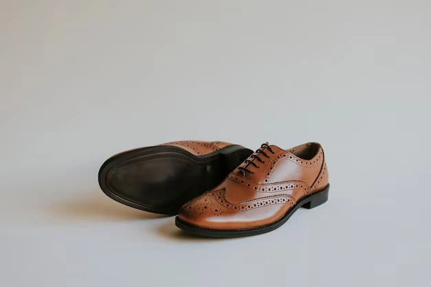 Brown man's leather derby shoes
